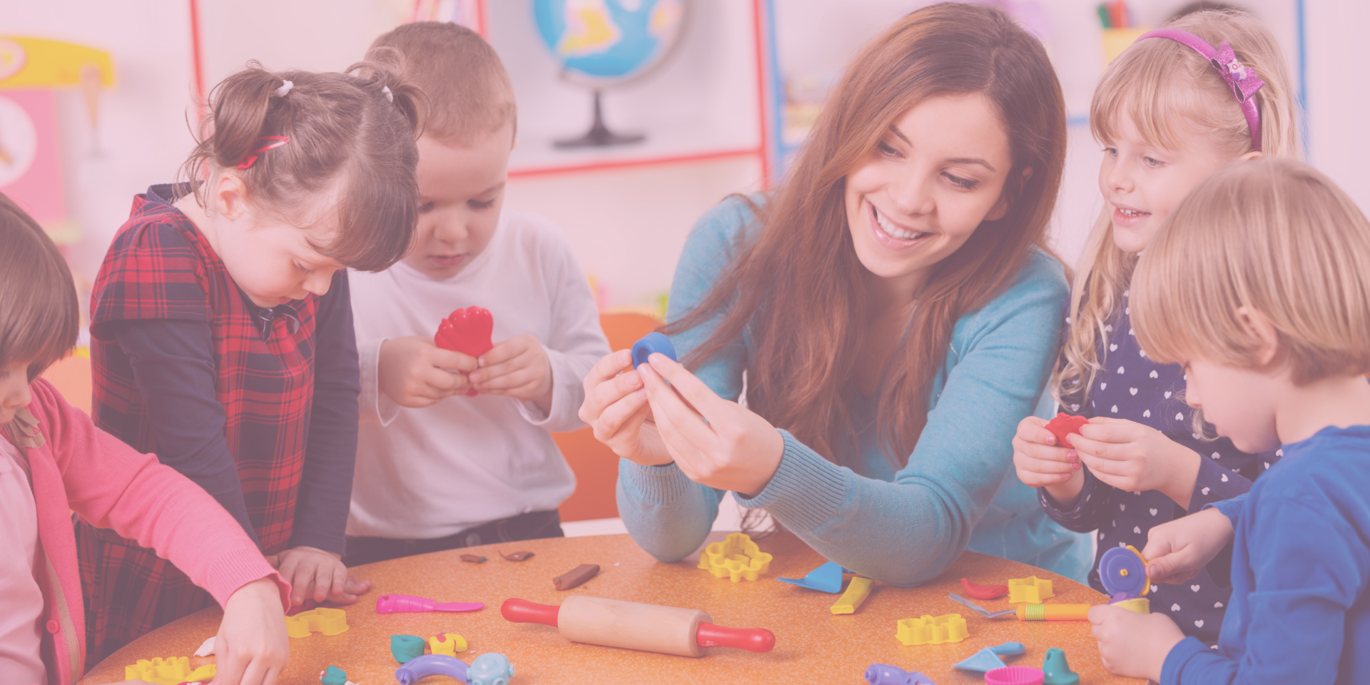 Children playing in a vibrant indoor playground with soft play areas for toddlers and a play city with swings and slides for older kids at Playtime Waco